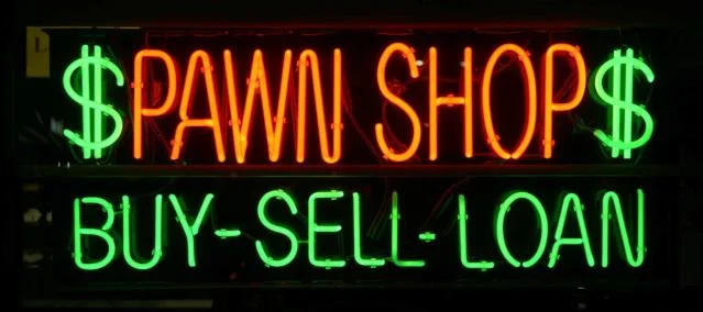 a Pawn Sign lit up for business after they implemented tactics from OMS's digital marketing strategies
